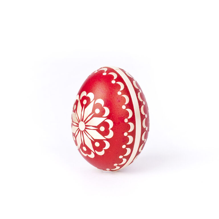 painted Easter egg decorated with straw chicken a