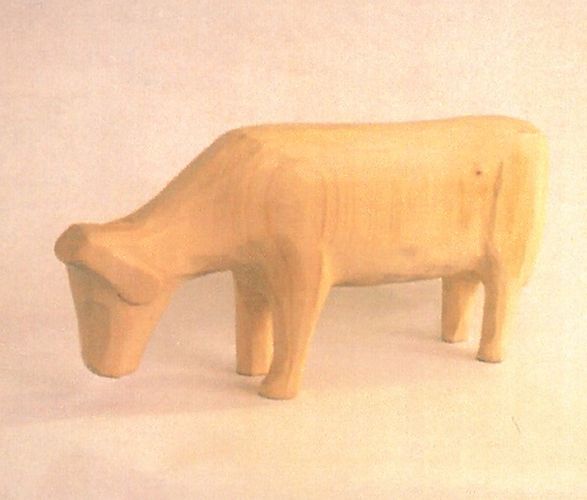 soška drevená kravička