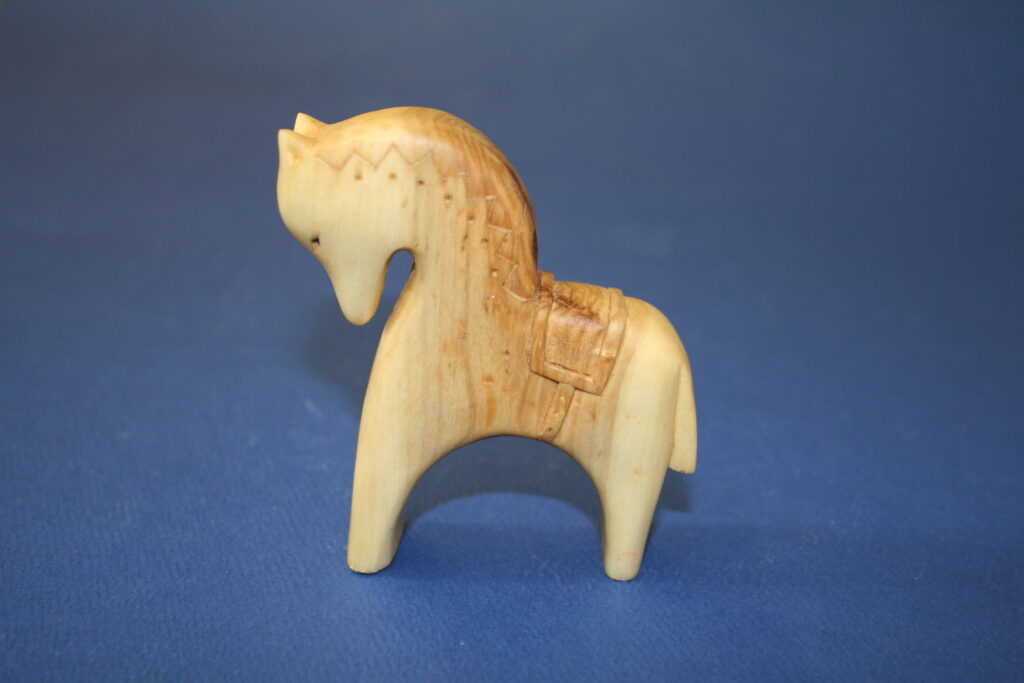 small natural wooden horse