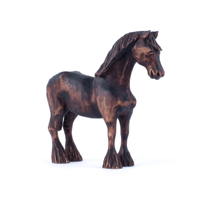Wooden statue of a horse carved by hand